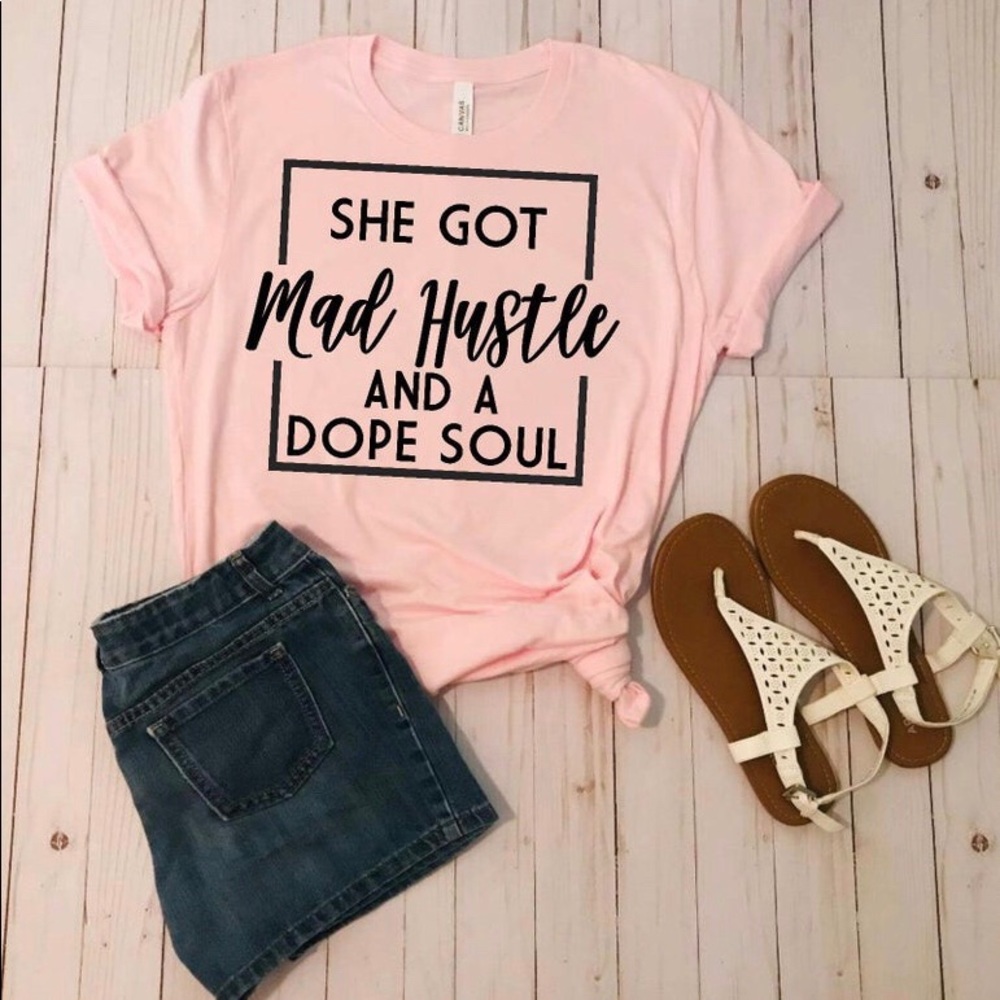 She got mad Hustle and a Dope soul tee